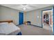 Bedroom with a blue accent door and neutral paint at 392 Hightower Ridge Rd, Covington, GA 30014