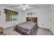 Bedroom featuring neutral carpet and a decorative headboard at 392 Hightower Ridge Rd, Covington, GA 30014