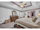 Main bedroom features a decorative wallpaper, carpeted floors, and a closet at 392 Hightower Ridge Rd, Covington, GA 30014