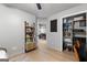 This bedroom features a well-lit study nook and organized closet with ample shelving space at 111 Rosignol Dr, Sharpsburg, GA 30277