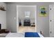 View into playroom area with skylight, guitar, and shelving with storage bins at 111 Rosignol Dr, Sharpsburg, GA 30277