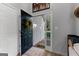 Inviting foyer with neutral decor, leading to a bright and welcoming interior at 111 Rosignol Dr, Sharpsburg, GA 30277