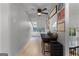 Bright office space featuring a skylight, desk, and comfortable sitting area at 111 Rosignol Dr, Sharpsburg, GA 30277