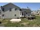 The backyard features a wooden deck, green grass, and space for entertaining at 132 Scarlett Place Dr, Bowdon, GA 30108