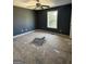 Bedroom featuring neutral walls, natural light from a single window, and ceiling fan at 132 Scarlett Place Dr, Bowdon, GA 30108