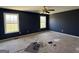 Spacious bedroom with two windows, ceiling fan, and neutral walls, ready for customization at 132 Scarlett Place Dr, Bowdon, GA 30108