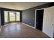 Spacious living room with large bay windows offering natural light and views at 132 Scarlett Place Dr, Bowdon, GA 30108
