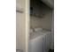 Laundry room featuring a white washer and dryer with a small shelf above at 1432 Eagles Nest Cir, Carrollton, GA 30116
