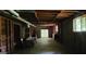 This is an unfinished basement featuring exposed ductwork and a window at 1992 Kunuga Dr, Jonesboro, GA 30236