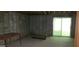 Unfinished basement features concrete walls, sliding doors, and plenty of potential for customization at 1992 Kunuga Dr, Jonesboro, GA 30236