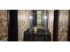 The bathroom has dual sinks and a modern black and white wallpaper at 1992 Kunuga Dr, Jonesboro, GA 30236