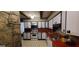Functional kitchen area with tiled floors, ample cabinet space, and red countertops at 1992 Kunuga Dr, Jonesboro, GA 30236