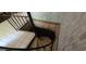 This interior shot shows a spiral staircase with white tile steps at 1992 Kunuga Dr, Jonesboro, GA 30236