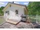 Spacious deck with grill on an exterior view of a home at 204 First St, Bowdon, GA 30108