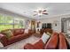 Spacious living room with wood-look floors, comfortable seating, and ample natural light at 204 First St, Bowdon, GA 30108