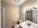 Clean, refreshed bathroom features new fixtures and bright lighting at 3730 Stephanie Sw Dr, Atlanta, GA 30331