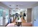 Bright eat-in kitchen featuring stainless steel appliances, granite countertops, and a view to the backyard at 5765 Woodstone Dr, Cumming, GA 30028