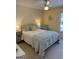 Cozy bedroom featuring a white metal bed frame and coordinated decor at 187 Pine Branch Dr, Stockbridge, GA 30281