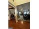 Bright and airy living room features hardwood floors and a fireplace, offering a comfortable gathering space at 187 Pine Branch Dr, Stockbridge, GA 30281