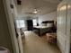 Spacious main bedroom boasts ample natural light, tray ceiling, and plush carpet at 187 Pine Branch Dr, Stockbridge, GA 30281