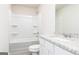 Modern bathroom featuring a tub and shower combination and a granite countertop vanity at 303 Limestone Circle, Conyers, GA 30013