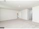 Spacious bedroom with plush carpet and plenty of natural light from several windows at 303 Limestone Circle, Conyers, GA 30013