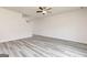 Spacious living area featuring modern gray floors and ample natural light at 303 Limestone Circle, Conyers, GA 30013