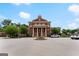 Beautiful building with brick facade, grand columns, well-manicured landscaping and circular driveway at 2100 Willshire Gln, Alpharetta, GA 30009