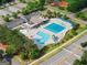 Aerial view of the community pool, featuring swimming areas, a splash pad, and lounging spaces at 2100 Willshire Gln, Alpharetta, GA 30009