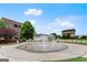 A scenic fountain surrounded by lounge chairs, with appealing buildings in the backdrop, creates an inviting ambiance at 2100 Willshire Gln, Alpharetta, GA 30009