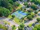 Neighborhood tennis courts and playground surrounded by mature trees in a well maintained community at 2100 Willshire Gln, Alpharetta, GA 30009