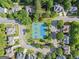 Aerial view of the tennis courts surrounded by lush greenery within the neighborhood at 2100 Willshire Gln, Alpharetta, GA 30009