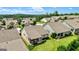 Aerial view of well-manicured lawns, cozy covered porches, and neatly arranged homes in a suburban neighborhood at 123 Mulberry Ct, Peachtree City, GA 30269