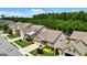 Beautiful home aerial showcasing landscaping, hardscape and setting at 123 Mulberry Ct, Peachtree City, GA 30269