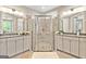 Bathroom featuring a glass enclosed shower and and sinks at 123 Mulberry Ct, Peachtree City, GA 30269