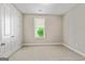 Empty bedroom with carpet, white trim, and a window view at 123 Mulberry Ct, Peachtree City, GA 30269