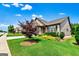 Charming home exterior with manicured front yard featuring lush landscaping and inviting curb appeal at 123 Mulberry Ct, Peachtree City, GA 30269