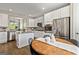 Well-lit kitchen featuring stainless steel appliances and adjacent dining area at 123 Mulberry Ct, Peachtree City, GA 30269