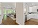 Open-concept living space connecting the kitchen and Gathering room, perfect for entertaining with lots of natural light at 123 Mulberry Ct, Peachtree City, GA 30269