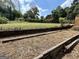 Backyard featuring wooden terrace with some dry grass at 2334 Connally Dr, East Point, GA 30344