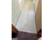 A partial view of the bathroom floor shows neutral-colored tile design at 2334 Connally Dr, East Point, GA 30344