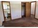 Bedroom featuring neutral walls with a bathroom and closet at 2334 Connally Dr, East Point, GA 30344