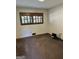 View of a carpeted bedroom with a window at 2334 Connally Dr, East Point, GA 30344