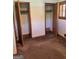 Bedroom featuring carpeted flooring and closets at 2334 Connally Dr, East Point, GA 30344