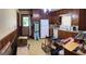 A cluttered kitchen showing dated appliances and needing improvements at 2334 Connally Dr, East Point, GA 30344