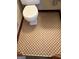 This toilet has a neutral colored tile floor with a contrasting dark brown trim at 2334 Connally Dr, East Point, GA 30344