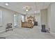 Finished basement bedroom with ceiling fan, bed, natural light, and neutral colored walls at 508 Las Brasis Ct, Peachtree City, GA 30269