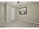 Comfortable bedroom with neutral carpet and ceiling fan, offers a serene atmosphere at 508 Las Brasis Ct, Peachtree City, GA 30269