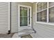 Close-up of the entrance showcasing the front door, siding, and landscaping at 508 Las Brasis Ct, Peachtree City, GA 30269