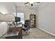 Home office with a ceiling fan, desk, and chair, ideal for remote work at 508 Las Brasis Ct, Peachtree City, GA 30269